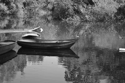 Boats in calm lake