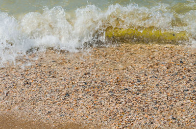 View of waves splashing on beach