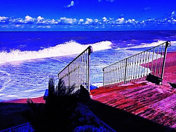 Pier on sea against sky