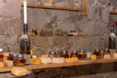 Wine bottles on table at home