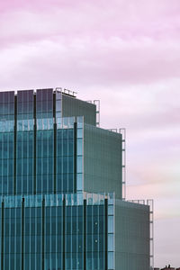 Low angle view of modern building against sky