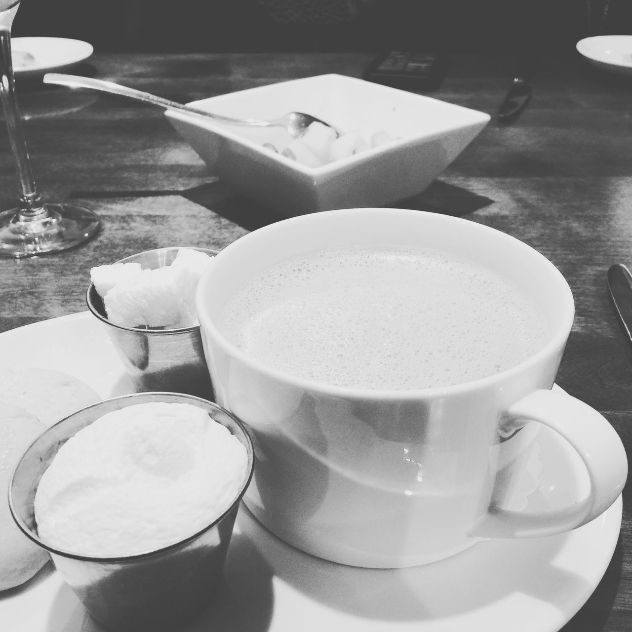 coffee cup, drink, saucer, food and drink, coffee - drink, indoors, refreshment, table, spoon, coffee, cup, still life, freshness, high angle view, close-up, plate, tea cup, frothy drink, cappuccino, white color