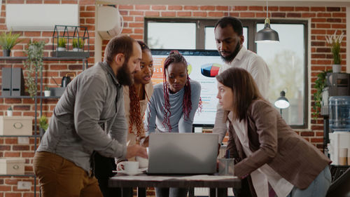 Business colleagues working at office