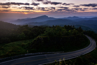 Scenic view of mountains against sky during sunset