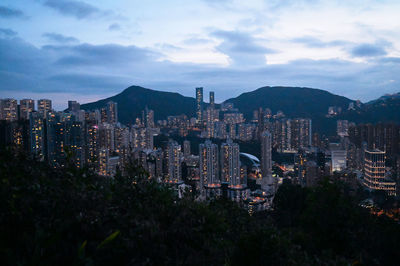 High angle view of buildings in city against sky