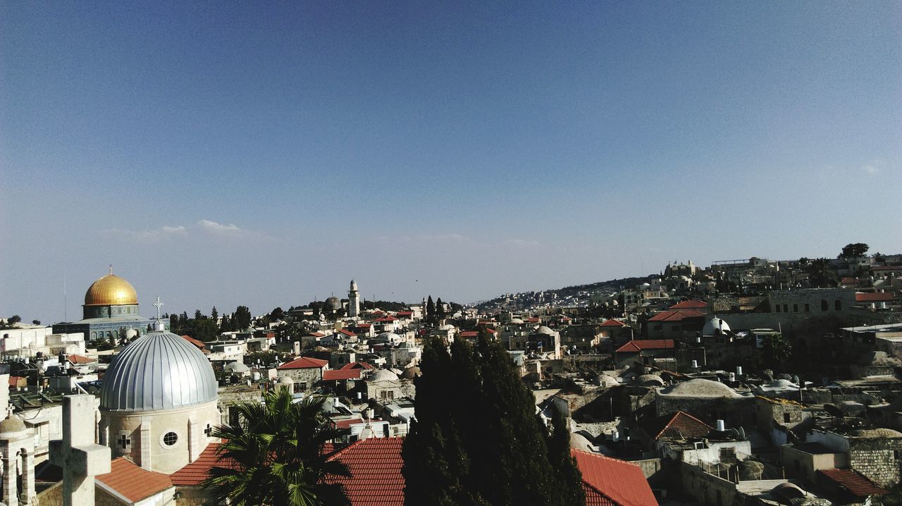 VIEW OF CITYSCAPE AGAINST CLEAR SKY