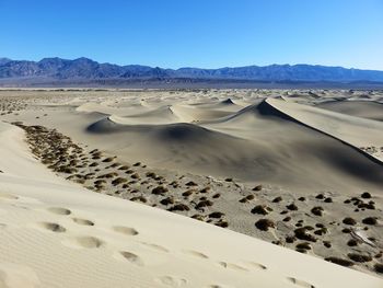 Scenic view of desert against sky