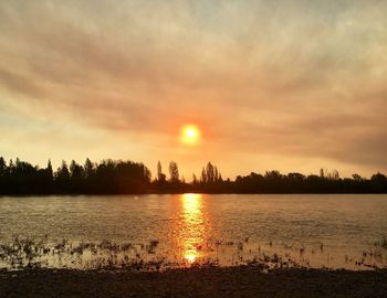 View of lake at sunset