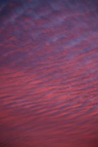 Low angle view of orange cloudy sky