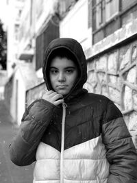 Portrait of teenage girl standing in winter