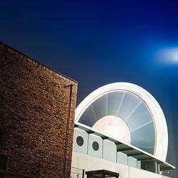 Modern building against clear blue sky