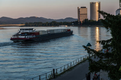 Scenic view of river against sky during sunset