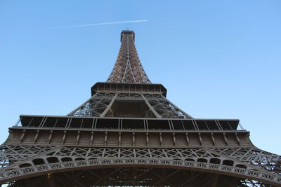 Low angle view of tower against blue sky