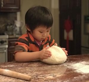 Cute girl preparing food at home