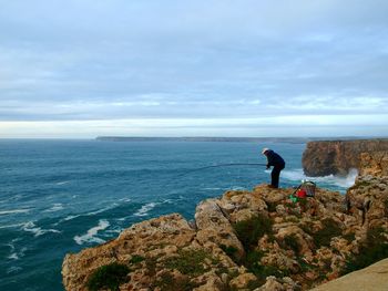 Scenic view of sea against cloudy sky