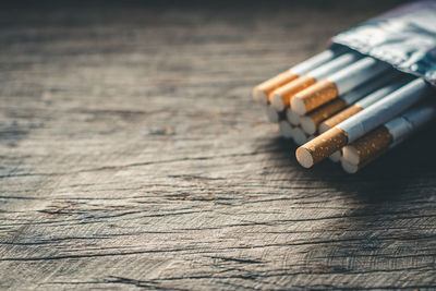 High angle view of cigarette on table
