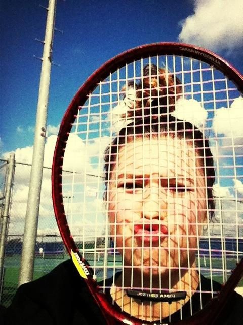 low angle view, metal, sky, built structure, architecture, metal grate, day, fence, glass - material, building exterior, circle, protection, outdoors, metallic, leisure activity, part of, sunlight, close-up