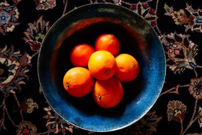 High angle view of fruits in bowl on table