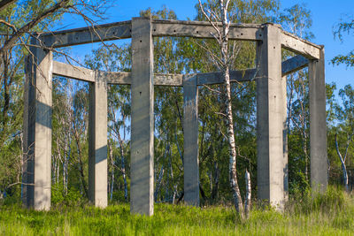 The ruins of a building belonging to an old factory reminiscent of the ruins of ancient buildings.