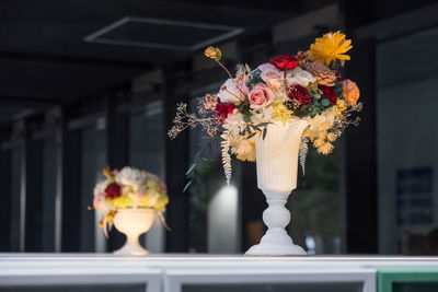 Close-up of flower vase on table