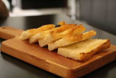 Close-up of sliced bread on cutting board