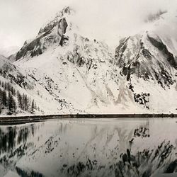 Scenic view of snow covered mountains