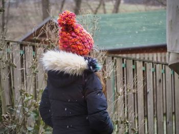 Close-up of woman in park during winter