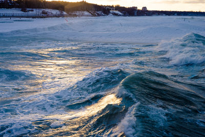 Aerial view of sea waves during winter