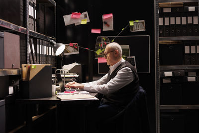 Portrait of man working in office