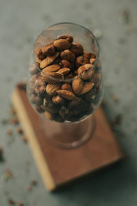 Close-up of roasted coffee beans on table