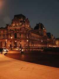 Illuminated building at night