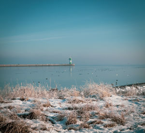 Travemünde lighthouse in winter and the sky is cloudless and blue
