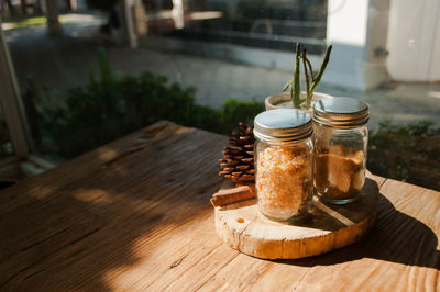 Close-up of glass of jar on table