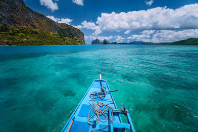 Scenic view of sea against blue sky