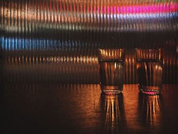 Drinking glasses on table in bar