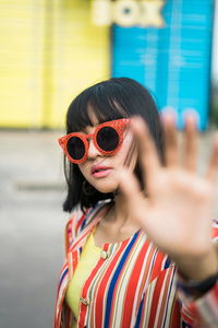 Portrait of woman wearing sunglasses