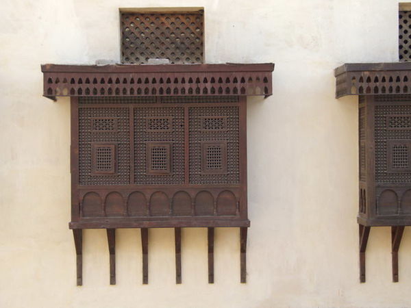 CLOSE-UP OF OLD BUILDING WITH WINDOWS