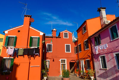 Low angle view of residential buildings against sky