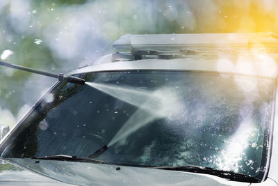 Close-up of wet car window