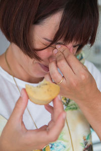 Woman eating horrible food