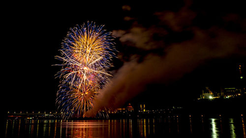 Firework display at night