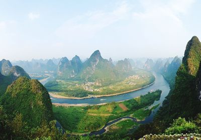 Panoramic view of the li river. many ships ply the river carrying tourists