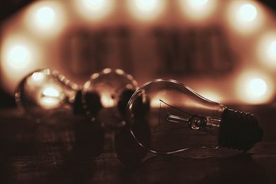 Close-up of illuminated light bulb