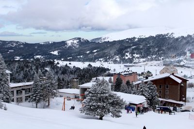 Scenic view of snow covered mountains