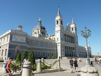 Low angle view of building against clear blue sky