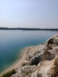 Scenic view of beach against clear sky