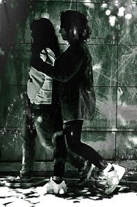 Woman standing at night