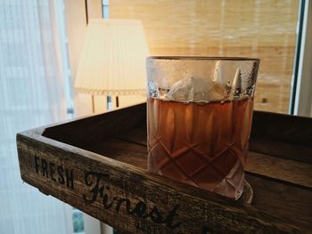 Close-up of beer glass on table