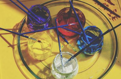 High angle view of drink colours on table