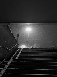 Low angle view of illuminated staircase at night